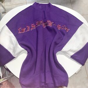 Purple and white crewneck sweatshirt